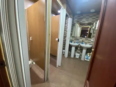 a bathroom with two sinks and a mirror at better Oh! in Valencia