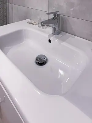 a white sink with a faucet in a bathroom at Valencia Apartamento Estilo italiano in Valencia