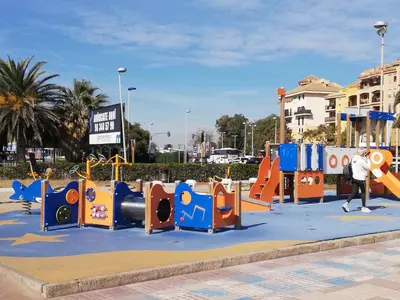 a park with a playground in a city at IDEALLY located on BEACH in Port Saplaya