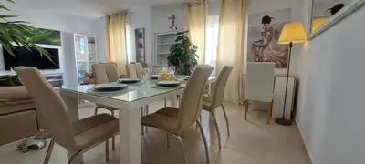 a dining room with a table and chairs at Apartamento Romero Valencia in Benicull