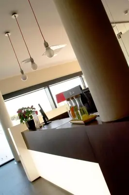 a kitchen with a sink and a counter top at Hotel AS Torrent in Torrent