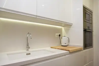 a kitchen with a sink and a mixer on a counter at Total Valencia Elegance in Valencia