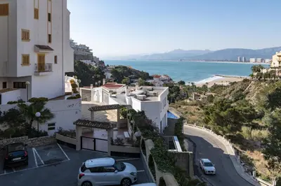 arial view of a building with a car parked in a parking lot at Nueva Vista 2º-4 in Cullera