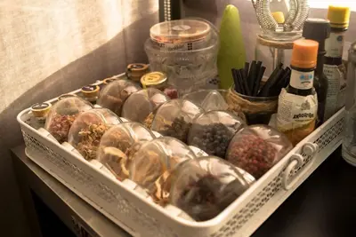 a container filled with different types of food at Céntrico y reformado con estilo in Valencia