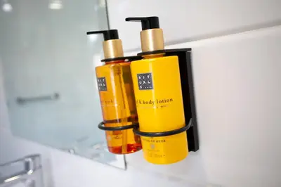 two bottles of essential oils sitting on a shelf at Casual Socarrat Valencia - Adults Only in Valencia