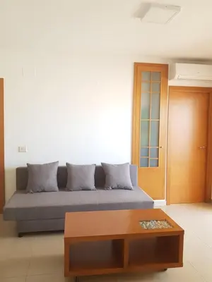 a living room with a couch and a coffee table at Moncofa Beach in Moncófar