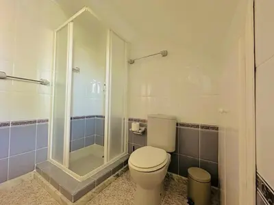 a bathroom with a toilet and a shower at Valencia Sol y Playa in Sagunto