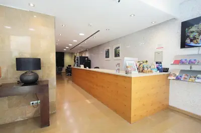 a lobby of a store with a reception desk at YOU & CO. Quart Boutique in Valencia