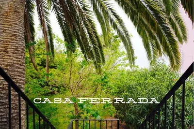 a fence with a sign that reads casa ferrara at Casa Ferrada in Burriana