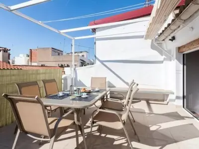 a patio with a table and chairs on a balcony at FLORIT FLATS - CENTER 2BR 2BA ATTIC TERRACE VIEW WIFi AC in Valencia