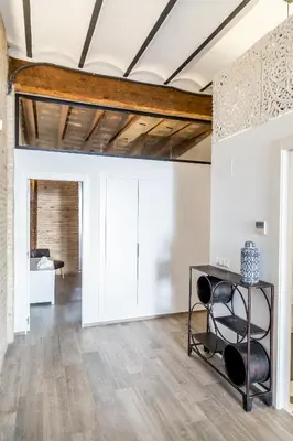 an open living room with a table and chairs at FLORIT FLATS - CENTER Luxurious 1BR 1BA Terrace WI-FI AC in Valencia