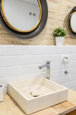 a bedroom with a bed and a table and a mirror at FLORIT FLATS - CENTER Luxurious 1BR 1BA Terrace WI-FI AC in Valencia