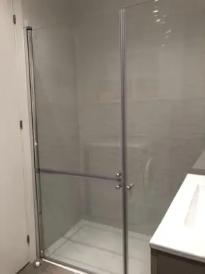 a shower with a glass door in a bathroom at Sun & Beach Pobla in Puebla de Farnals