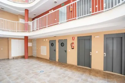 a hallway with four elevators in a building at Ideally Located Holiday Apartment in Moncófar