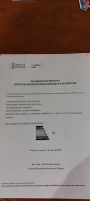 a piece of paper on a table with a letter at Vacaciones en Valencia in Burjasot