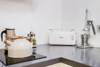 a kitchen counter with a toaster and a appliance at G&V APARTMENTS CLOSE to CENTER in Valencia
