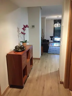 a living room with a dresser and a living room at Loft en la Ciudad de las Ciencias y cerca de la playa in Valencia