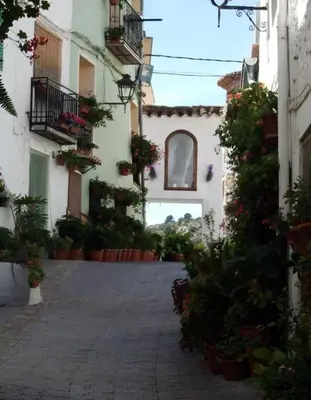 a sign on the side of a building at La Casa Mora in Jérica