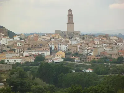 a view of a city with a clock tower at La Casa Mora in Jérica