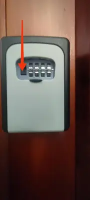 a remote control sticking out of a wall at Calicanto House & Pool in Torrent