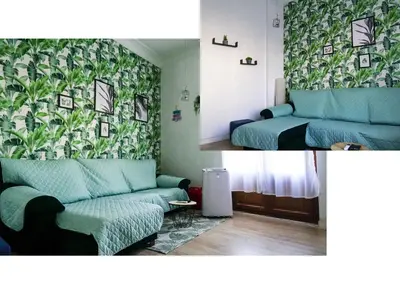 a living room with a couch and a bed at Ruzafa Apartment in Valencia