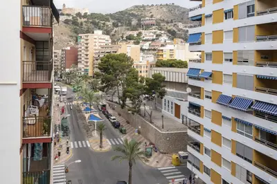 a view of a street in a city with buildings at ROS MARY, 7º-14 in Cullera