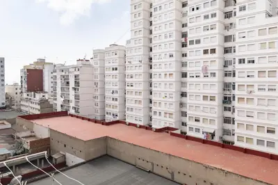 a view of a tall white building at ROS MARY, 7º-14 in Cullera