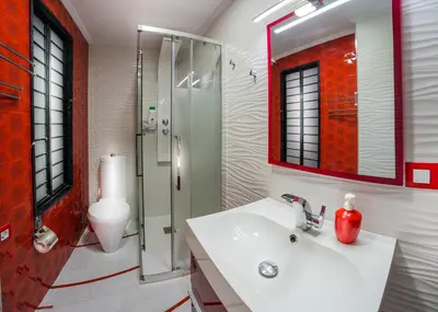 a bathroom with a sink and a shower and a toilet at Terrasa de Mercado Central in Valencia