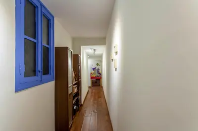 a hallway with a blue window and a white wall at LUXURIOUS & ALLURING HOME IN HISTORIC TOWN (VALENCIA) in Valencia