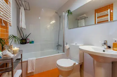 a bathroom with a toilet and a sink and a shower at LUXURIOUS & ALLURING HOME IN HISTORIC TOWN (VALENCIA) in Valencia