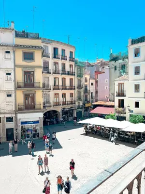 a group of people walking around a city square at Happy Apartments Valencia – Lope de Vega in Valencia