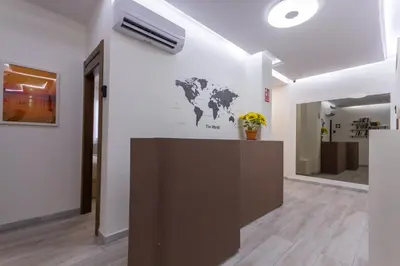 a room with a wall with a world map on it at A Casa Martínez B&B in Valencia