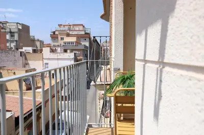 a balcony with a view of a city at Encantador apartamento junto al Mediterraneo by Hometels in Puerto de Sagunto