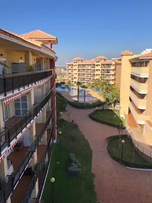arial view of a courtyard of a apartment building at Urbanización Mar de Canet, 2 dormitorios con piscina comunitaria, garaje y wifi in Canet de Berenguer