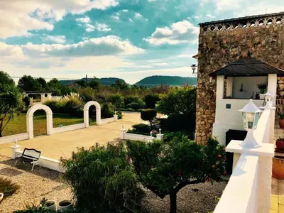 a view of a garden with a building at LEMON TREE VILLA in Monserrat