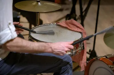 a man playing a drum set on a drum kit at Palacio Santa Clara, Autograph Collection in Valencia