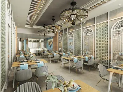 a restaurant with tables and chairs and a chandelier at PAMPHYLIA HOTEL in Valencia