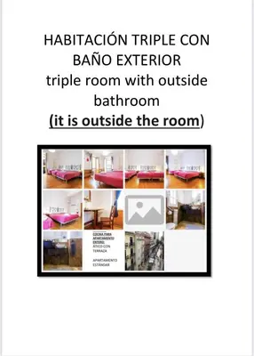 a screenshot of a dorm room with a room with a table at Kasa Katia Guest House in Valencia