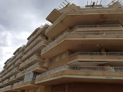 a building with balconies on the side of it at Parquemar I Solo Familias Serviplaya in Casas Las Basas