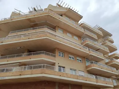 a building with balconies on the side of it at Parquemar I Solo Familias Serviplaya in Casas Las Basas