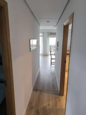 a hallway with a door leading into a room at Bet Apartments - Sunrise Beach Apartments in Valencia