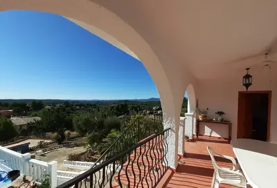 a balcony of a house with a view at Casa Loro Loco B&B in Pedralba