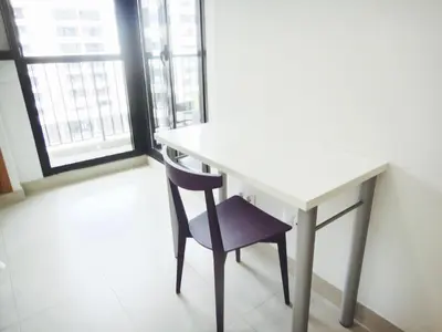 a white desk with a chair next to a window at Patacona Beach Power!! in Valencia