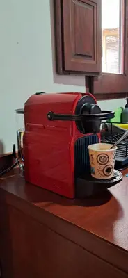 a red toaster sitting on top of a kitchen counter at Valencia Canyamelar Beach Apartments in Valencia
