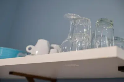 a shelf with wine glasses on top of it at Cozy Flat in City Center Feel the Vibe SelfCheckIn in Valencia
