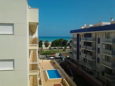 a view of the ocean from a balcony of a building at Atico playa Moncofar in Moncófar