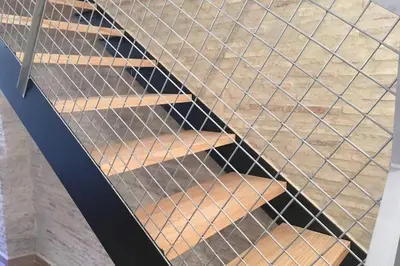 a set of stairs with a metal railing at Casa La Placeta in Fortaleny