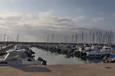 a bunch of boats parked in a marina at Apartamento nuevo playa de Canet de Berenguer WIFI in Canet de Berenguer