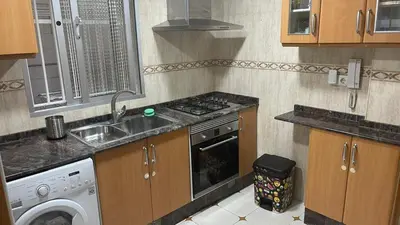 a kitchen with a sink and a stove top oven at Alquiler Universidades Malvarrosa Playa Maritim Valencia Solo para familias con niños in Valencia