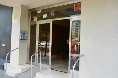 an entrance to a building with a revolving door at Apartemento grupo amigo o familias : blasco ibanez C in Valencia